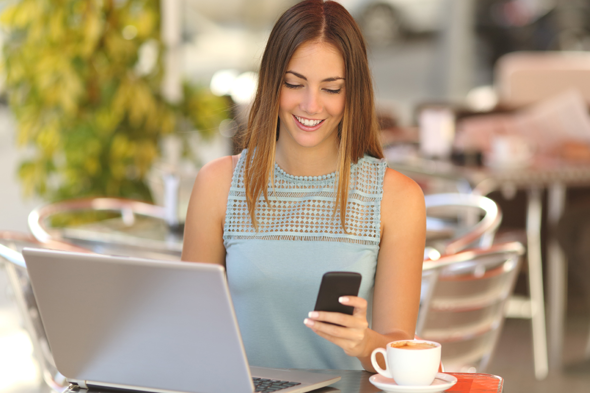 happy woman checking phone